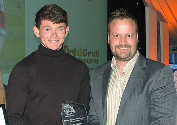 Ollie Burke is named the Melton Times Junior Sports Personality of the Year for 2015. Pictured with award sponsor Michael Wilford EMN-160316-121540002
