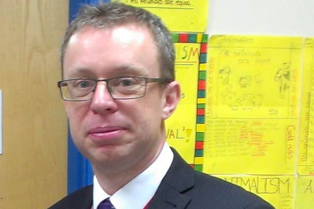 Long Field Academy principal Christopher Haggett EMN-160315-155754001