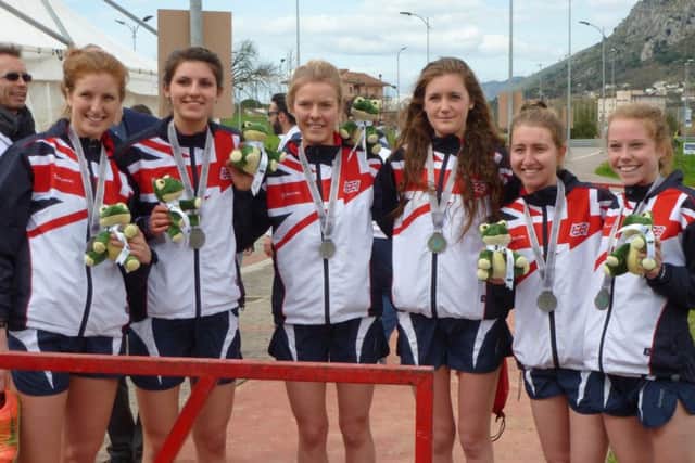 Mari Smith (second from left) and British team celebrate world cross country silver EMN-160315-191814002
