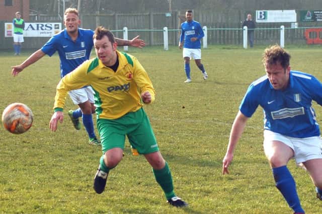 Aaron Ridout keeps his eye on the ball against South Normanton EMN-160316-090819002