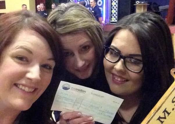 Pictured from left with their cheque are Friends of St Mary's School representatives Lindsay Moore, Hayley Curtis and Gem Booth EMN-160316-110330001