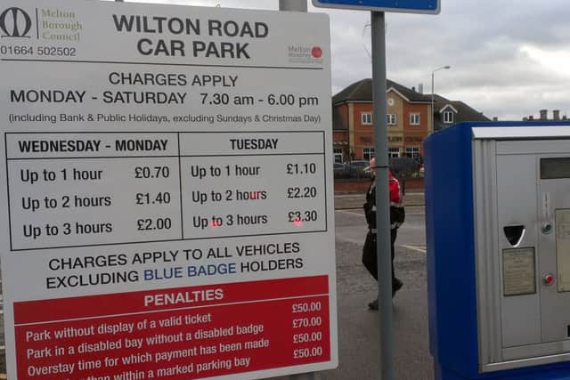 The sign in Melton Council's short stay Wilton Road car park showing its current charges for Monday to Saturday compared to the higher fees on Tuesday EMN-160318-155148001