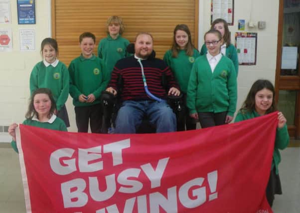 Inspirational former Leicester Tigers and England Under-21 rugby star Matt Hampson meets the Frisby Primary School pupils EMN-160318-170356001