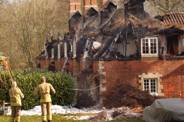 The row of fire-ravaged cottages at Bede Houses, Stapleford Road, Stapleford EMN-160322-115455001