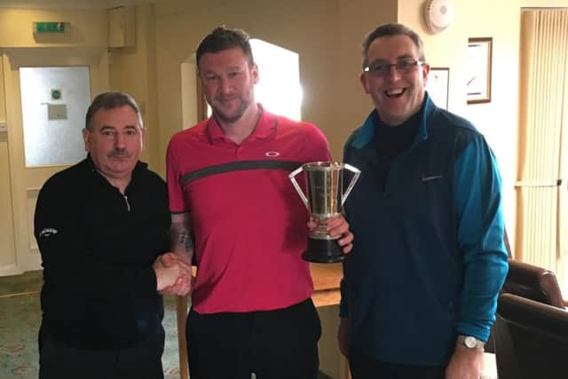 Autumn Trophy winner Anthony Halls with club captain Jack Inguanta (left) and competition organiser Chris Radford (right) EMN-160322-161038002