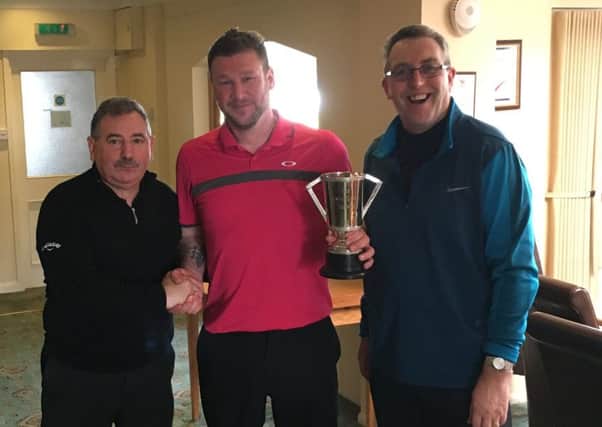 Autumn Trophy winner Anthony Halls with club captain Jack Inguanta (left) and competition organiser Chris Radford (right) EMN-160322-161038002