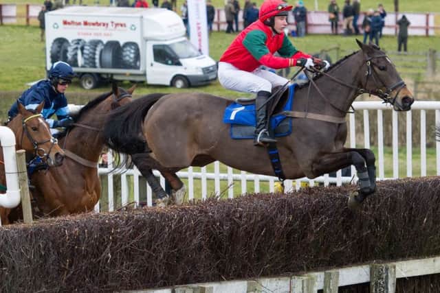 Tom Chatfeild-Roberts (SHES REAL) on his way to winning the Mares and Fillies race EMN-160322-171225002