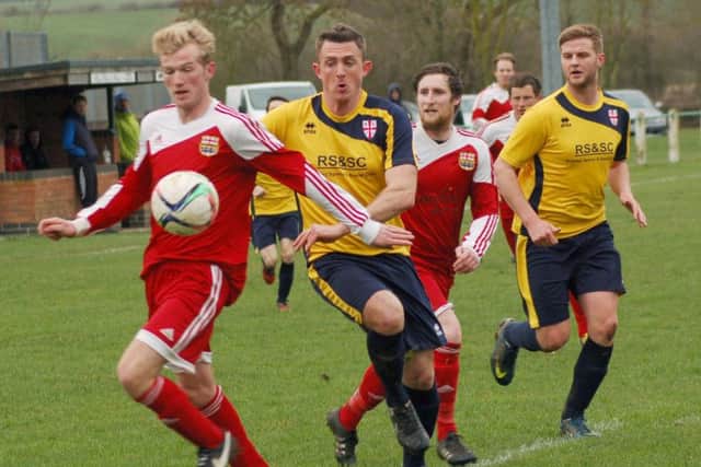 Shannon Myring (left) and David Hazeldine look to combine during Saturday's 3-0 win against Rothley EMN-160330-105318002
