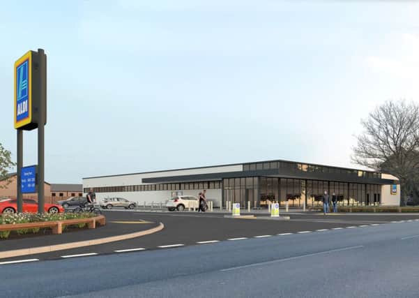 An artist's impression of the proposed new Aldi store EMN-160323-171049001