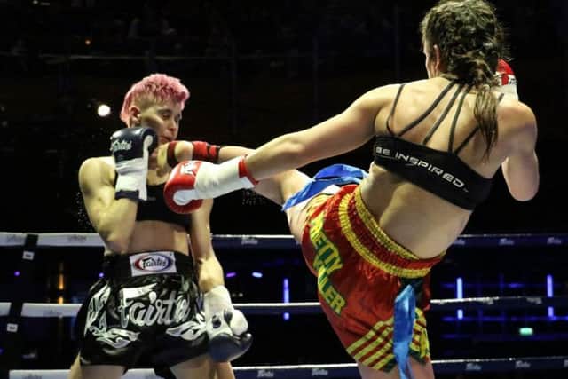 Iman lands a kick during the high profile Muay Thai contest PHOTO: Rakowska Photography EMN-160330-095605002