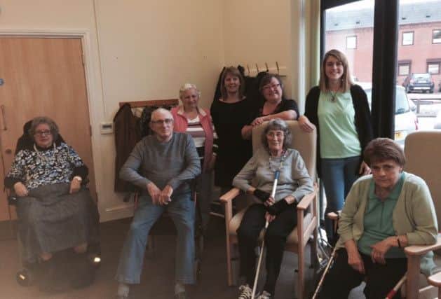 Some of the visitors and staff at an Age UK session at Gloucester House, Melton PHOTO: Supplied