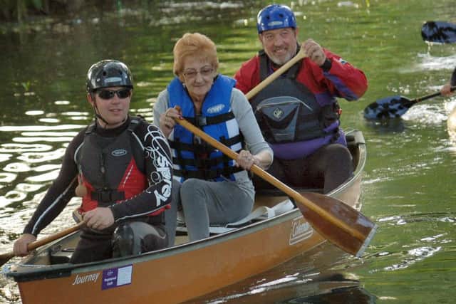 The late Margaret Moore, Mayor of Melton for 2010-11, is pictured here in May, 2011, rowing with Scout leaders Carl Culley and Mike Gant PHOTO: Tim Williams EMN-160104-150139001