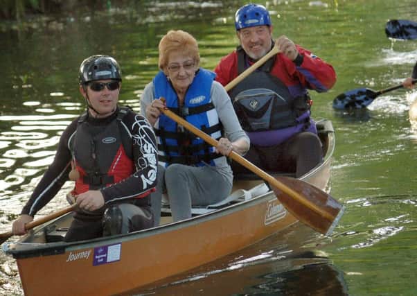The late Margaret Moore, Mayor of Melton for 2010-11, is pictured here in May, 2011, rowing with Scout leaders Carl Culley and Mike Gant PHOTO: Tim Williams EMN-160104-150139001