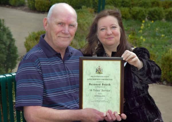 Bernard receives his long service certificate from Mayor of Melton Jeanne Douglas EMN-160604-095120001