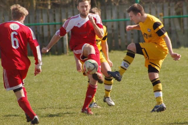 Ash Palfreyman gets his foot to the ball during the 1-0 defeat to Blaby and Whetstone Athletic Reserves EMN-160604-095048002
