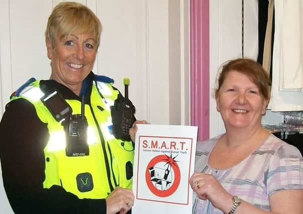 Pcso Andrea Kemp, of the Melton town centre beat team, with Julie Swayne, of JJs Lingerie in Melton, who is the SMART co-ordinator EMN-160604-120813001
