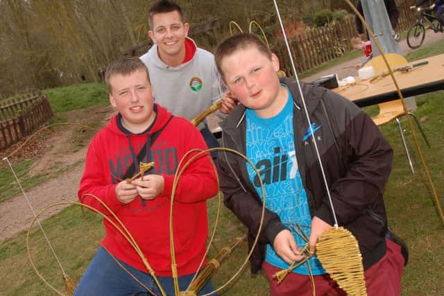 Willow weavers Tom Askew, and brothers Danny and Kieran Taylor with some of their creations
PHOTO: Tim Williams