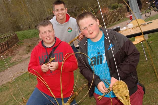 Willow weavers Tom Askew, and brothers Danny and Kieran Taylor with some of their creations 
PHOTO: Tim Williams