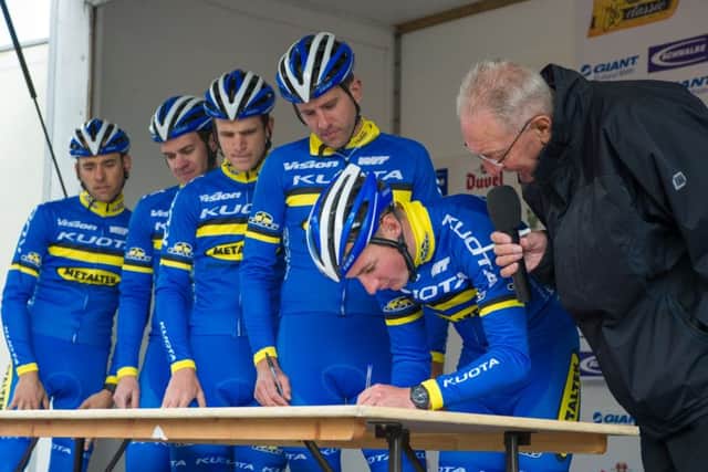 Melton's Metaltek Kuota team with race compere Hugh Porter at the 2014 Rutland-Melton CiCLE Classic EMN-150422-113253002