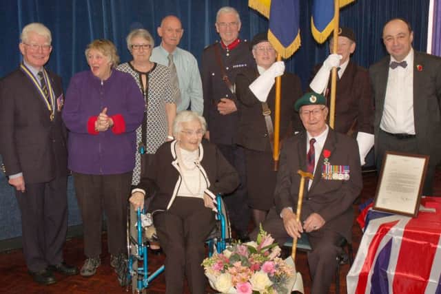 Melton man Maurice Darker is pictured here with his wife, Joan, and family, members of the Royal British Legion, Midlands region French Consol Jean-Claude Lafontaine and the Deputy Lieutenant of Leicestershire David Wryko. EMN-160419-152517001