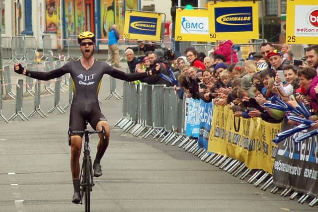 Conor Dunne milks the applause as he crosses the line in Sherrard Street for the biggest win of his career EMN-160425-105614002