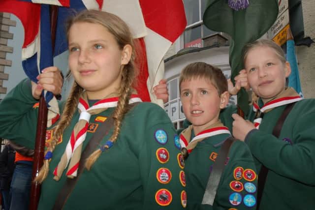 Standard bearers Victoria Richardson, Jake Duncan and Ellie Bendall all set for the parade EMN-160425-120833001