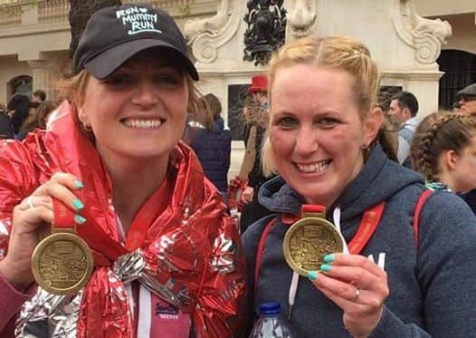 Friends Sarah Foode, of Asfordby Valley, and Emma Stevens, of Asfordby Hill, with their medals EMN-160426-105527001