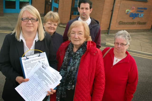 Holding some of the petitions is resource centre manager Rhonda Fazackerley with ward councillors Margaret Glancy, Pam Posnett , Simon Lumley and resident Mary Allen.