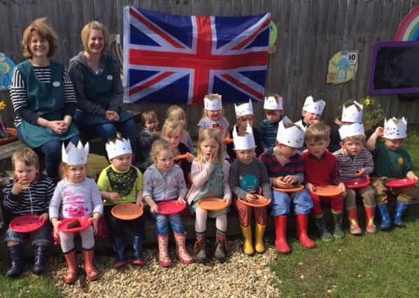 Children and some of the staff at Great Dalby Pre-School are pictured celebrating the Queen birthday with cakes and crowns PHOTO: Supplied