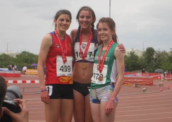 Mari Smith (left) with winner Jess Judd (centre) and bronze medallist Steph Pennycock EMN-160305-165554002