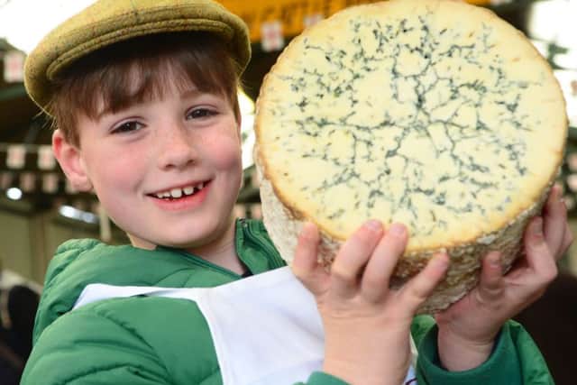 Jack Skailes (7) with a Cropwell Bishop Stilton cheese EMN-160305-174428001