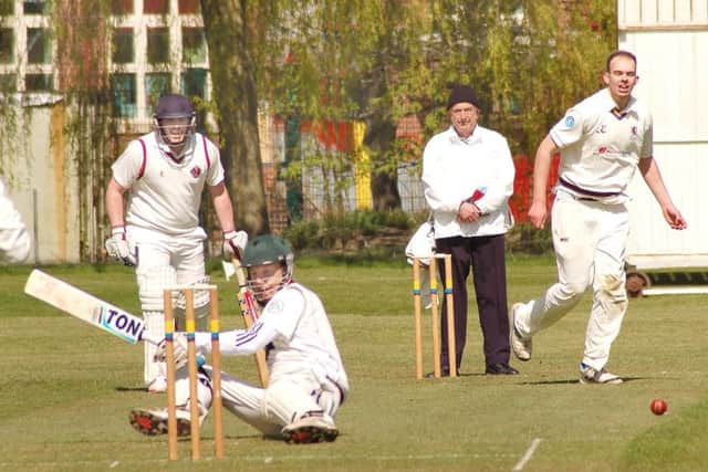 Muxloe's Mark Williamson ends up on the deck after a Tom Glover delivery EMN-160205-161551002