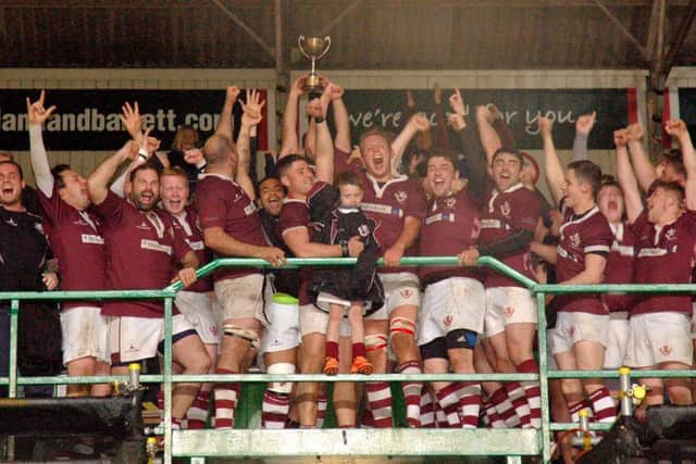 Joyous Melton lift the County Cup for the first time in their history EMN-160305-233609002