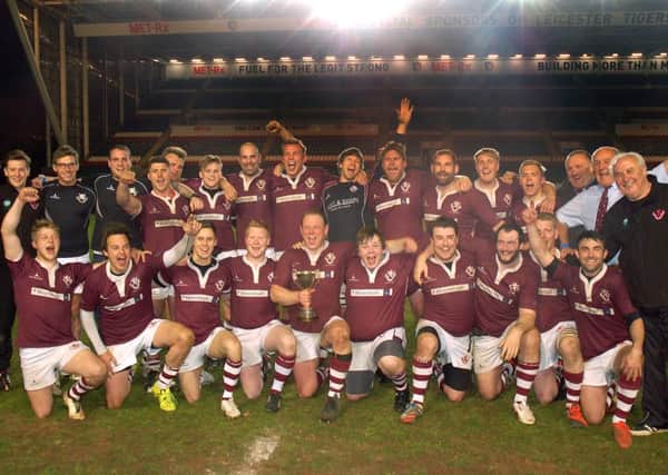 Melton RFC celebrate with the Leicestershire Senior County Cup at Welford Road EMN-160405-112448002