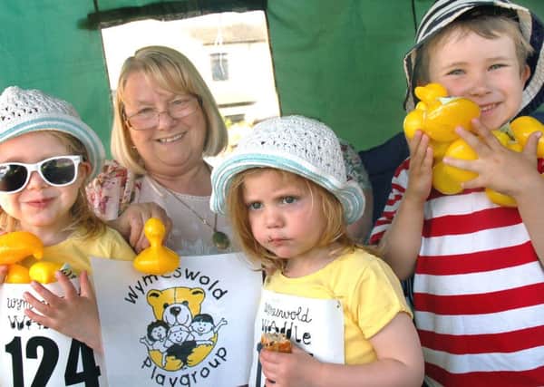 Jenny Edwards from Wymeswold playgroup with children Freya and Isla Godfrey and Sam Plant who are set to go duck racing PHOTO: Tim Williams