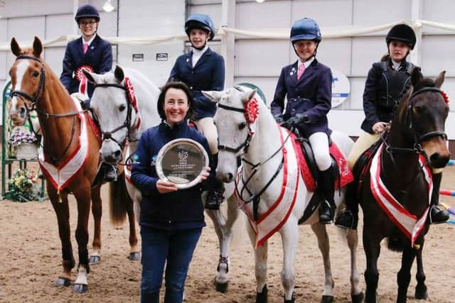 Team manager Tracy Walker with the Rearsby Lodge Riding Club team which won the junior National Intermediate Show Jumping Championships title, Connie Walker (14), Hannah Spray (12) Lily Walker (12) & Jade England (13) EMN-160905-160616002
