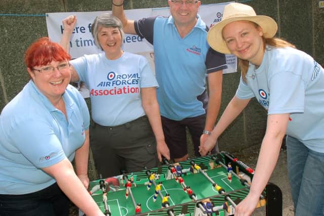 Celebratiing 1966 with a table football game are RAFA committee members Susie Harrison, Brenda Cox, Brian Fare and Laura Heggs