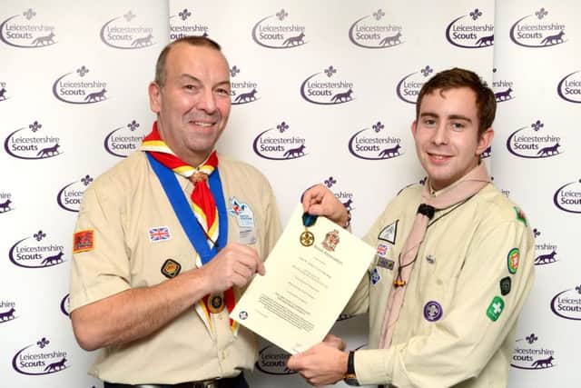 Adam received The Chief Scout's Commendation for Meritorious Conduct award from County Chairman Byron Chatburn at a leaders' awards evening in December EMN-161105-123035001
