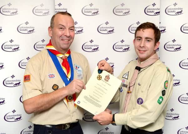 Adam received The Chief Scout's Commendation for Meritorious Conduct award from County Chairman Byron Chatburn at a leaders' awards evening in December EMN-161105-123035001