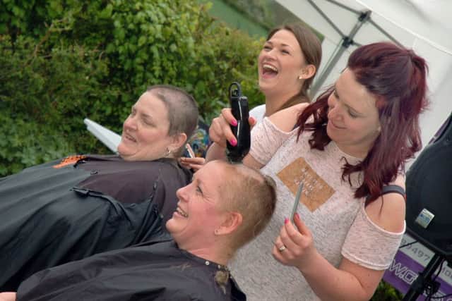 Hairdressers Georgina Steward and Nicola Croft go to work on Hazel Bonshor and Sally-Ann Watson 
PHOTO: Tim Williams