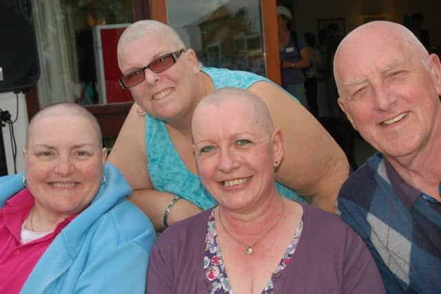 Hazel Bonshor, Denise Kemp, Sally-Ann Watson and David Garland show off their bald heads  PHOTO: Tim Williams