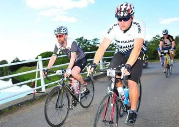 Alex Heyward (right) is cycling from Leicester to Paris 
PHOTO: Supplied