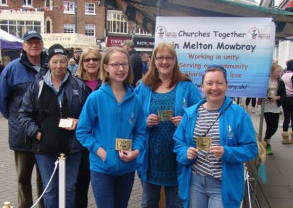 Members of Churches Together in Melton, street pastors and community chaplains are pictured at the 'Red Carpet Day' in the Market Place 
PHOTO: Supplied