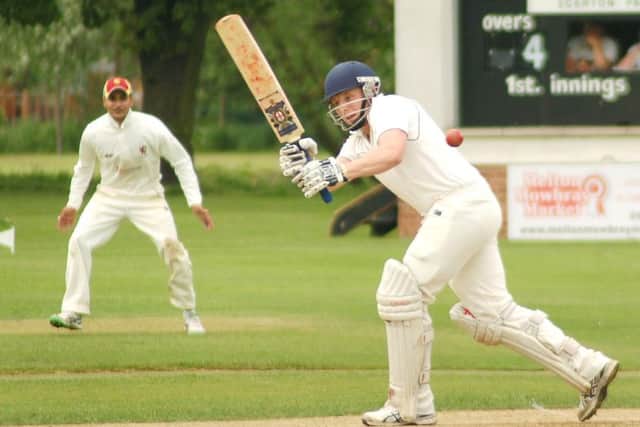 Ashby Carington top scorer Martin Troop at the crease, watched by Zaheer Hussain who hit a 50 in Egerton Park's reply EMN-160524-171008002