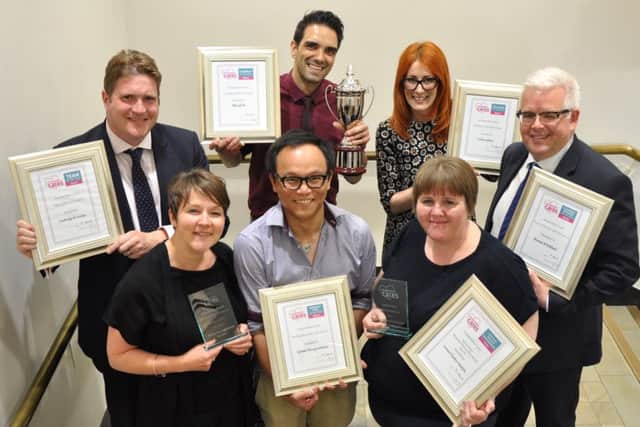 The Leicestershire Cares Awards 2016 winners. Sylvester Cheung, of Sylvester Cheung Architects, is pictured centre on the front row EMN-160519-100619001