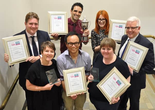 The Leicestershire Cares Awards 2016 winners. Sylvester Cheung, of Sylvester Cheung Architects, is pictured centre on the front row EMN-160519-100619001