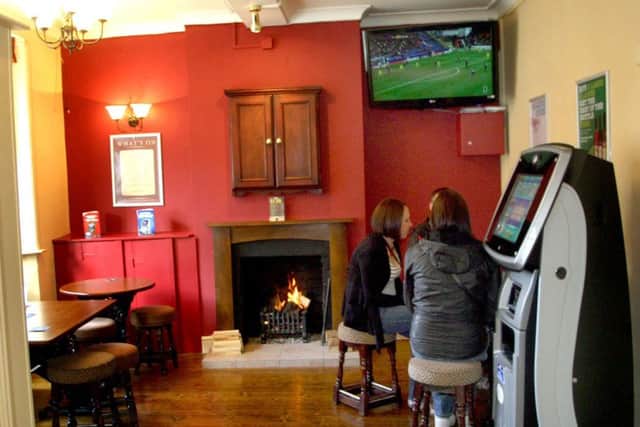 An old picture from inside the former Mash Tub pub in Nottingham Street, Melton, which has sold at auction for £178,000 EMN-160521-130112001