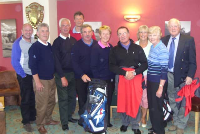 Club captains Jack Inguanta and Liz Snow with the Invitation Day afternoon winners. EMN-160524-162047002