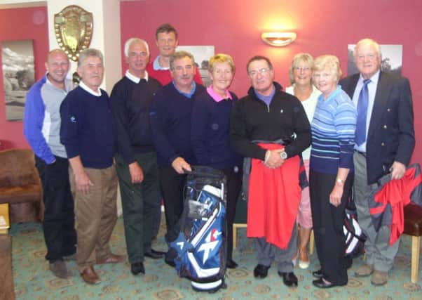 Club captains Jack Inguanta and Liz Snow with the Invitation Day afternoon winners. EMN-160524-162047002