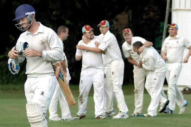 Park celebrate the key wicket of Buckminster opener Pete Morgan, taken on the first ball of last year's final EMN-160524-174117002